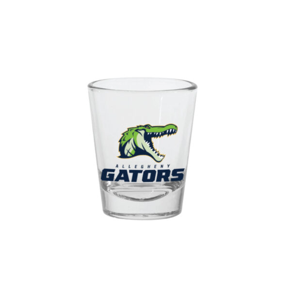 Clear shot glass with green gator logo and navy Allegheny Gators text.