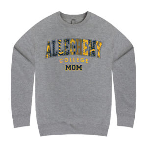 Gray long sleeve crew neck sweatshirt with an Allegheny College Wordmark logo. Each letter in Allegheny has a unique plaid or dotted design. Below the wordmark is a Mom imprint in Navy with a gold outline.